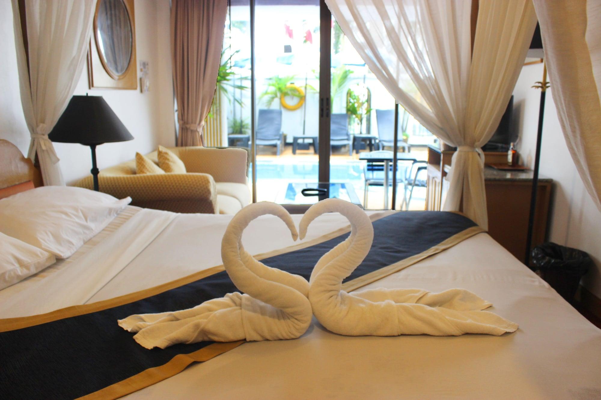 The Orchid Hotel Kalim Bay Patong Bagian luar foto